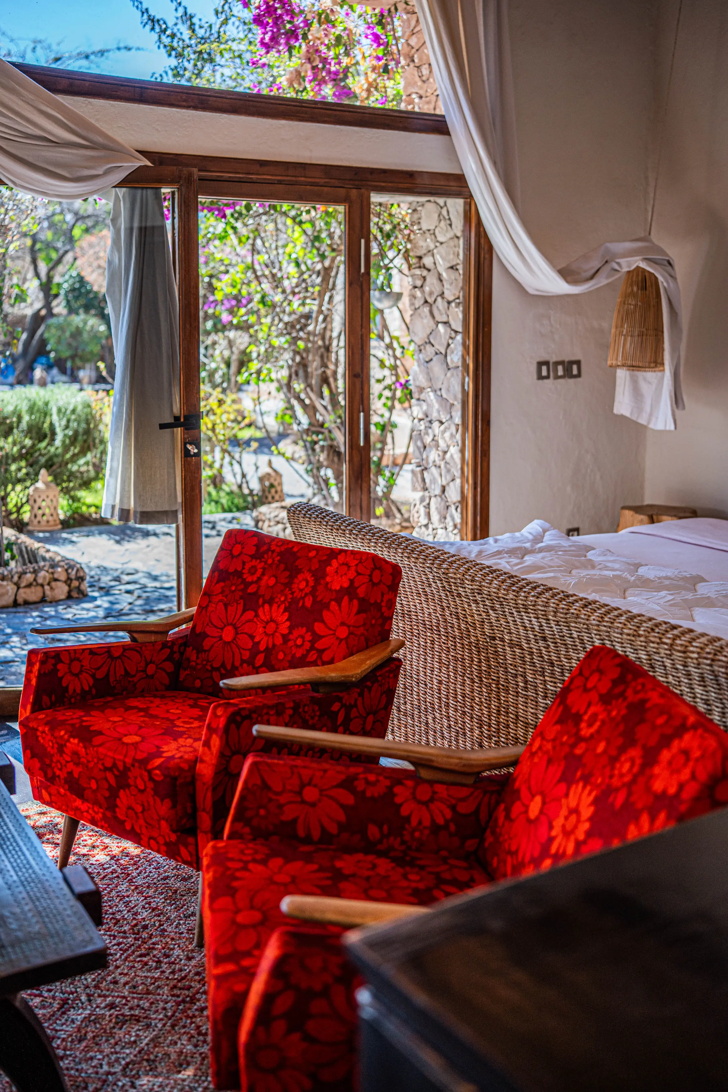 Cozy seating area with chairs inside a romantic couples suite at Pure Farmhouse