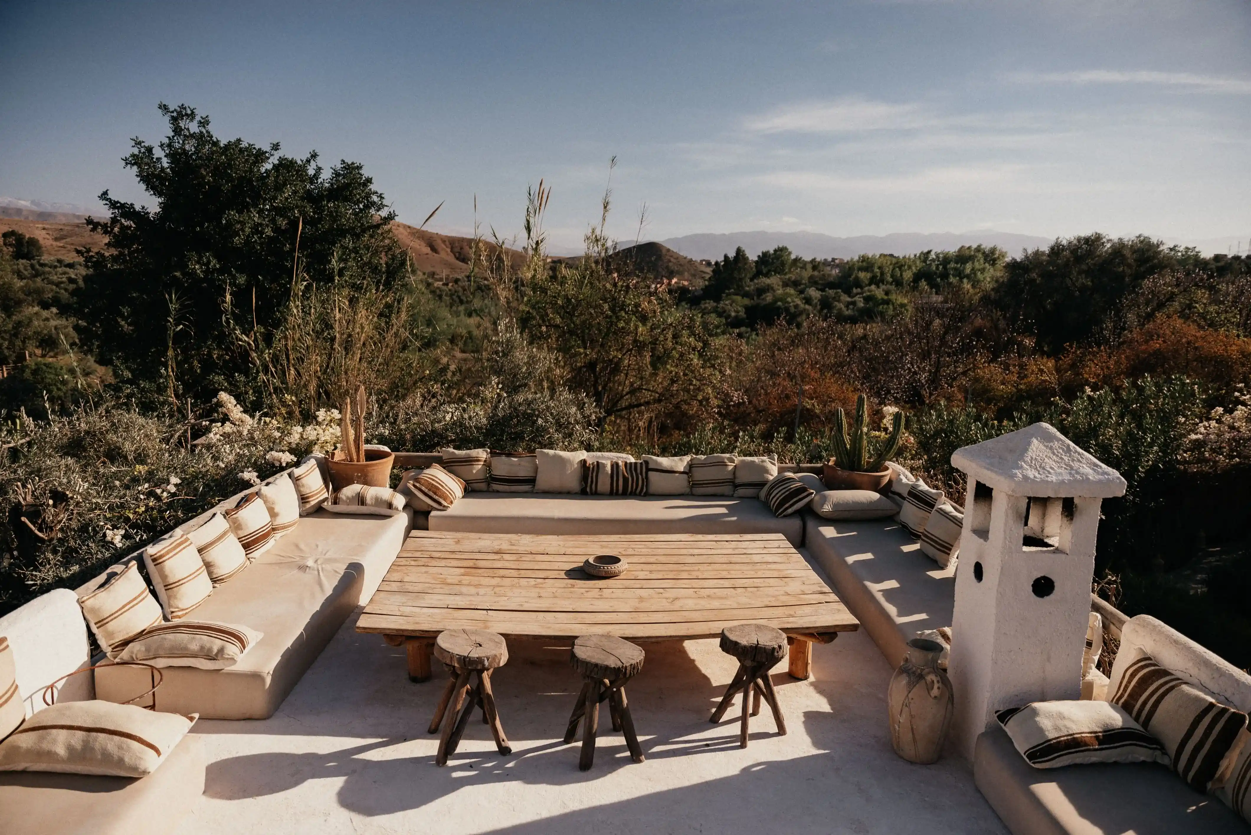 Outdoor lounge seating for adults to relax and enjoy the Agafay desert sunset at Pure House