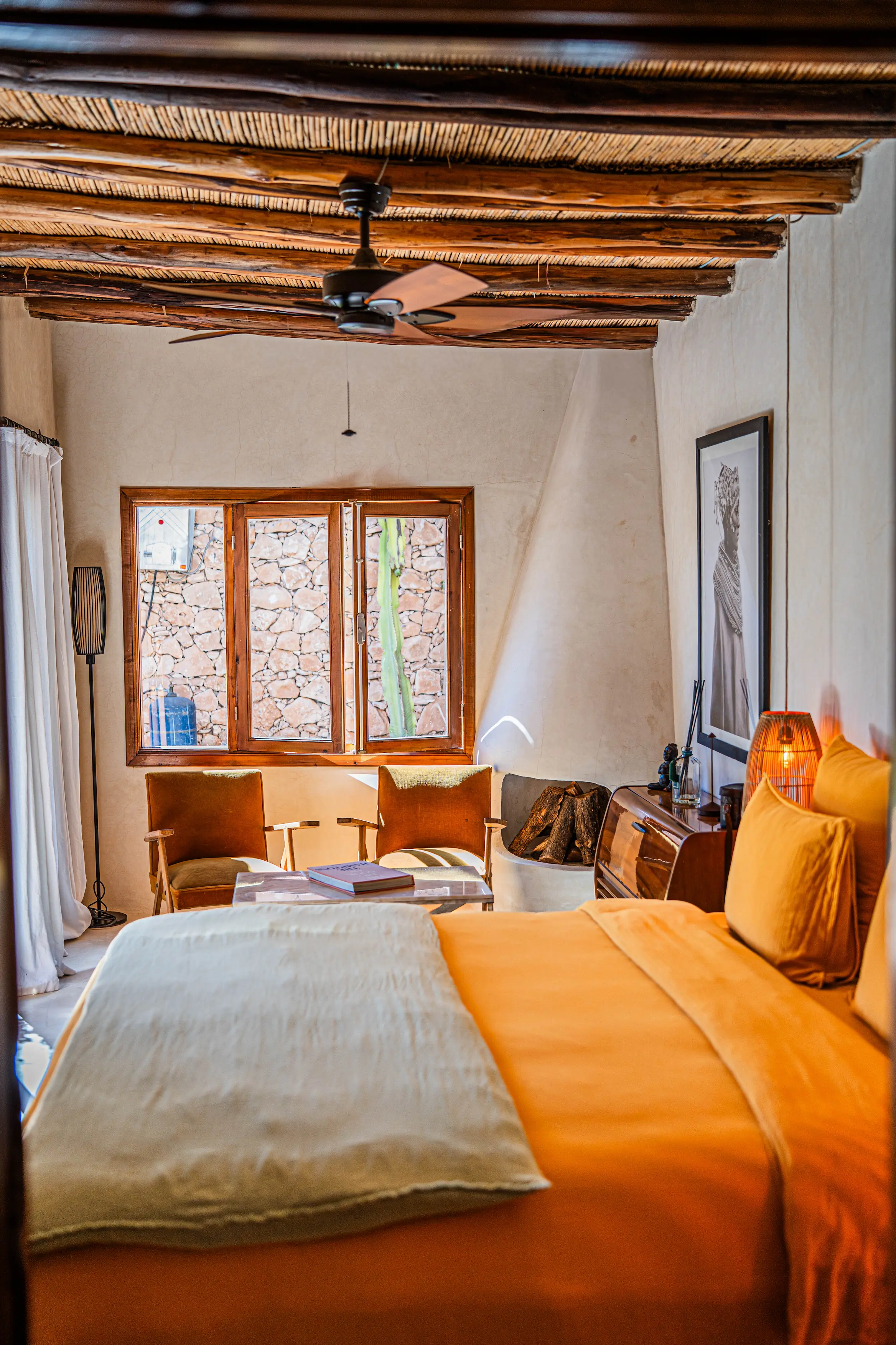 Comfortable eco lodge accommodation with natural light and rustic decor